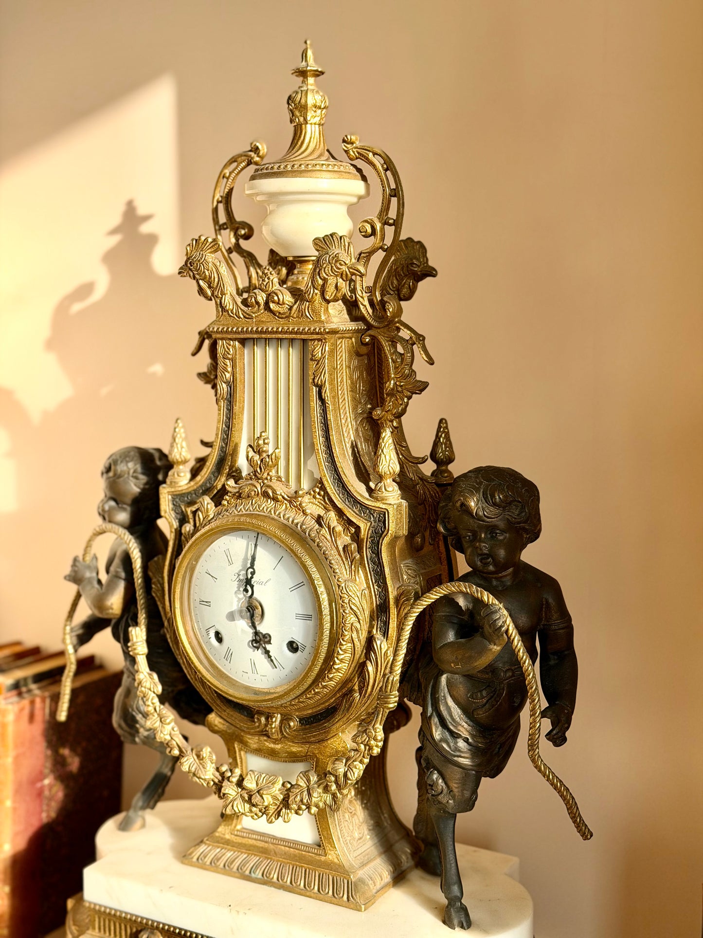 Heavy gilt bronze and marble clock