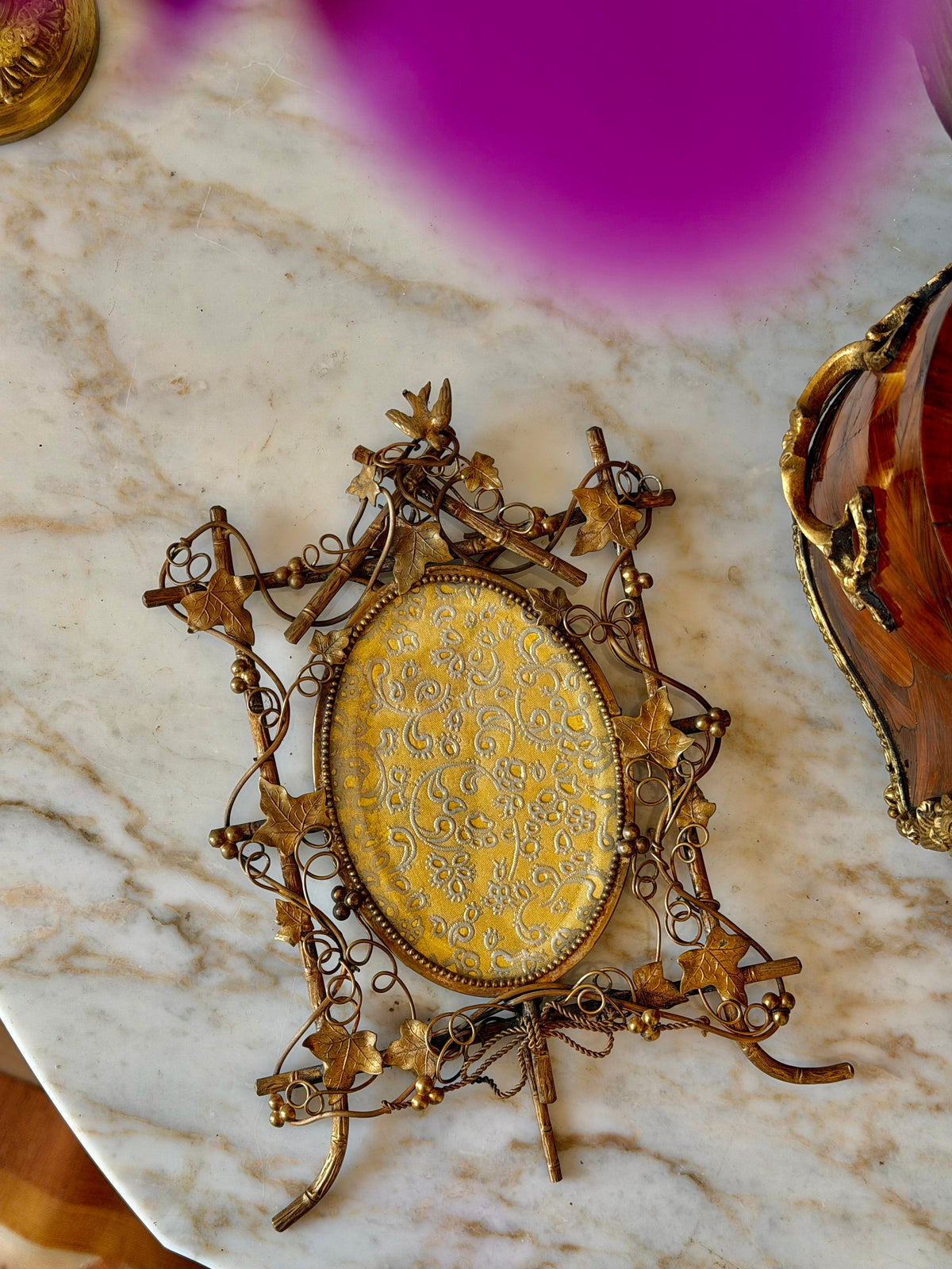 Ornate Gilt Bronze Perched Bird in Vines Frame