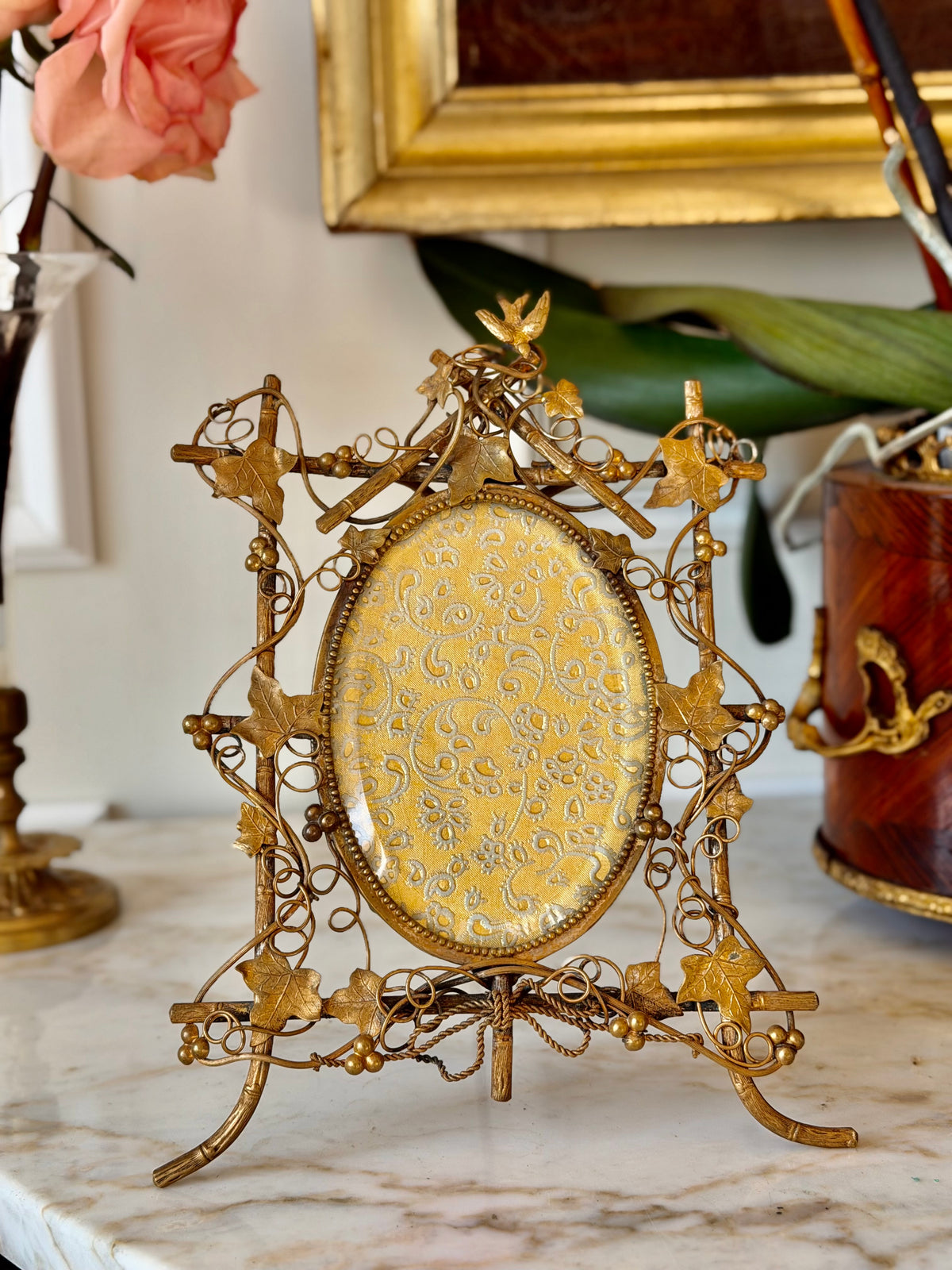 Ornate Gilt Bronze Perched Bird in Vines Frame