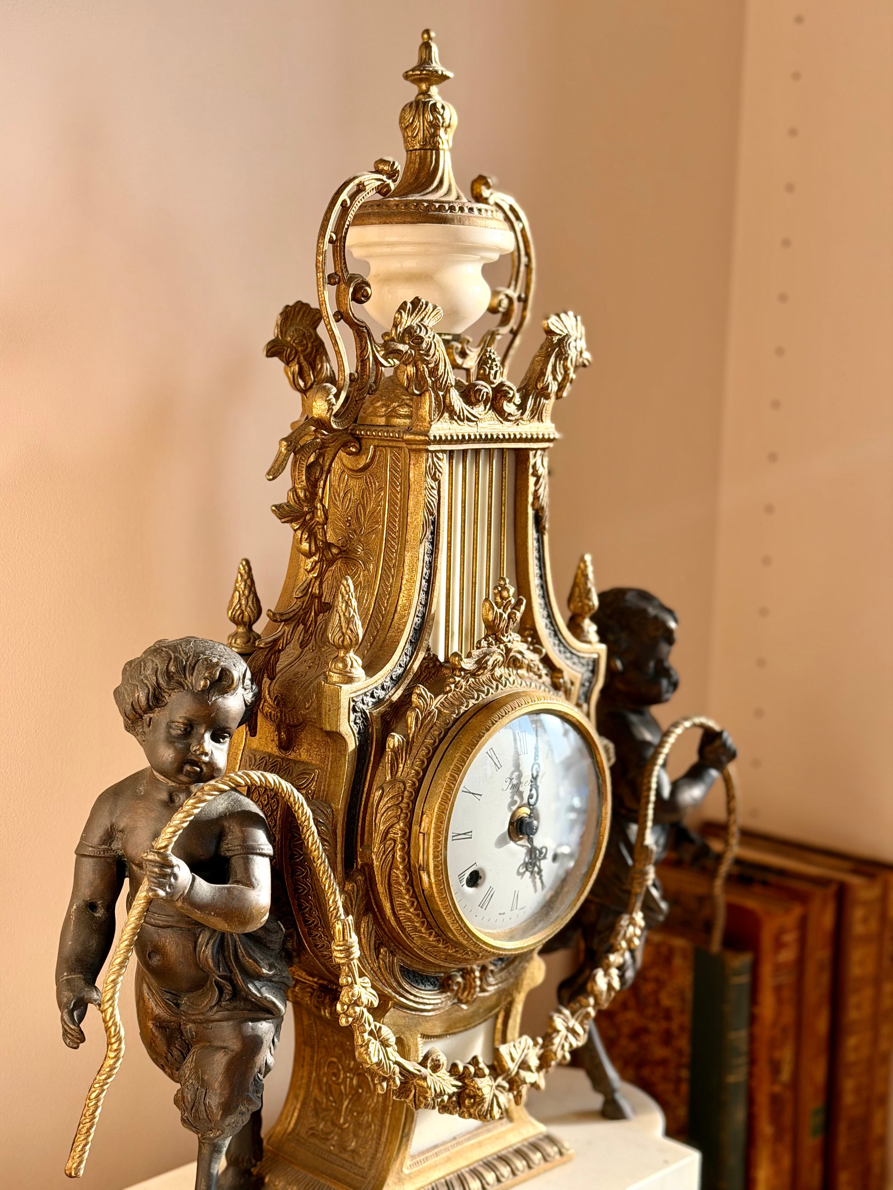 Heavy gilt bronze and marble clock