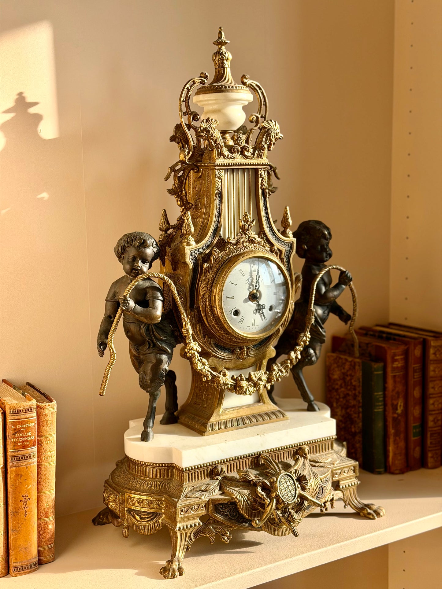 Heavy gilt bronze and marble clock