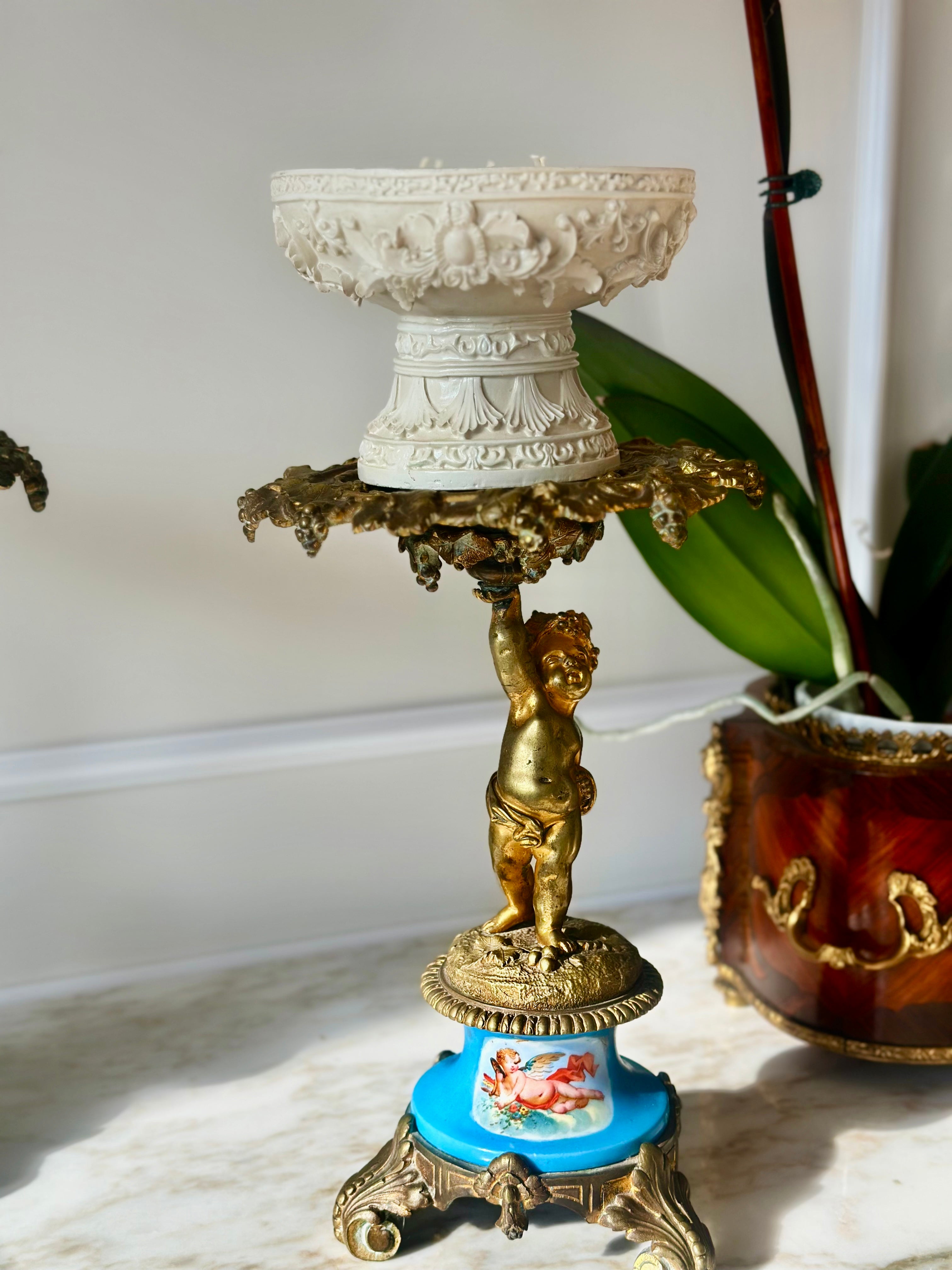 A Pair of Gilt Cherub Tazza Stands