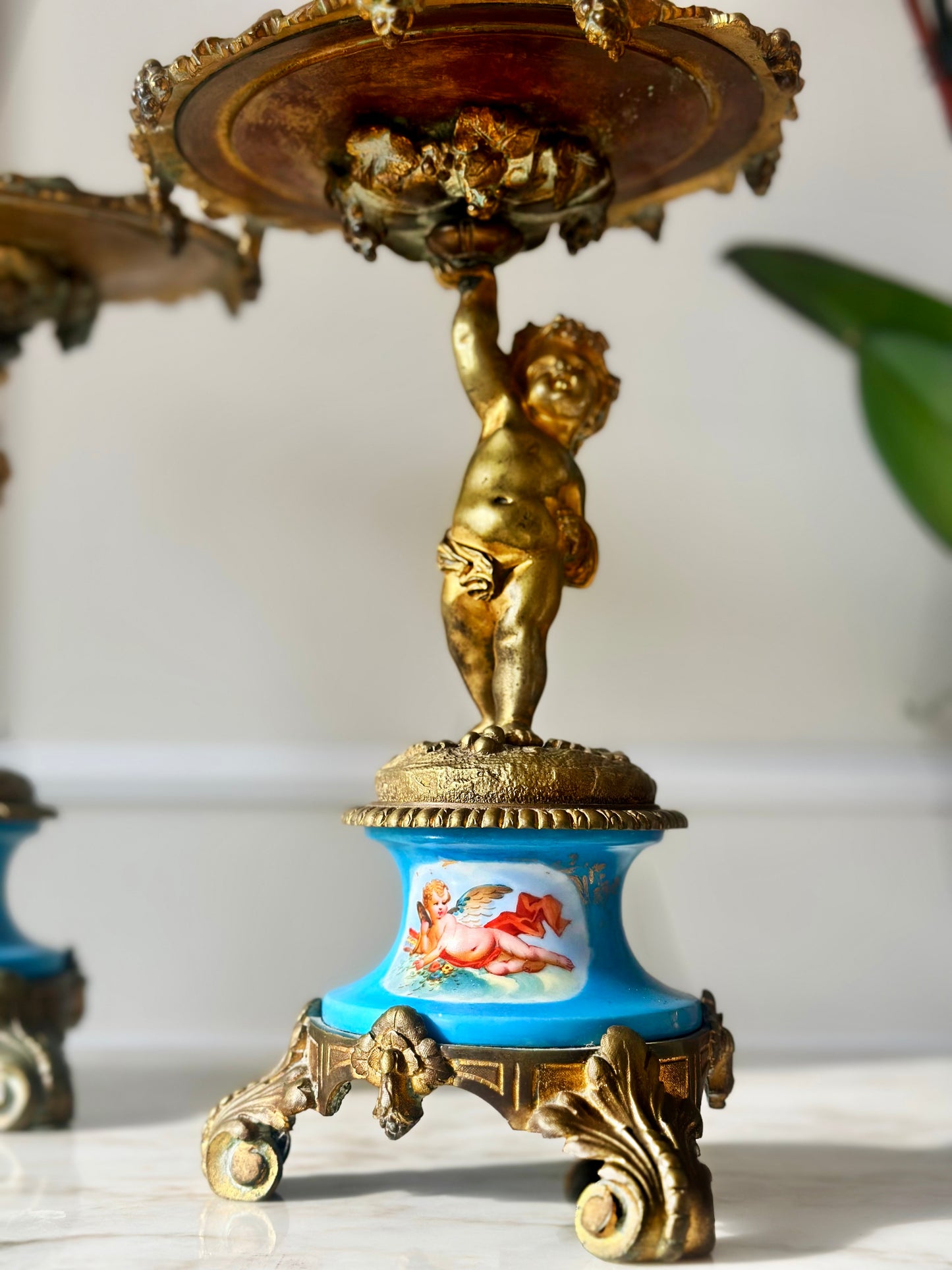 A Pair of Gilt Cherub Tazza Stands