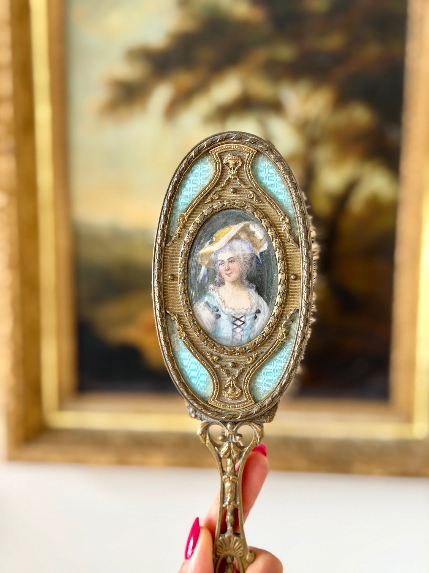 Gilt French guilloché hairbrush with a portrait