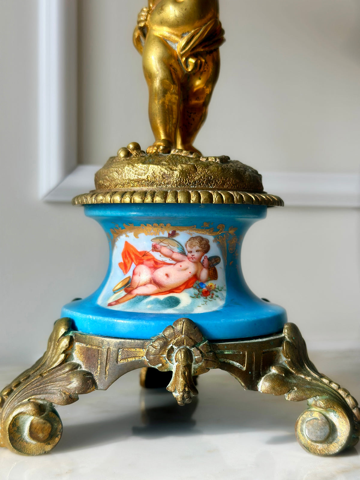 A Pair of Gilt Cherub Tazza Stands