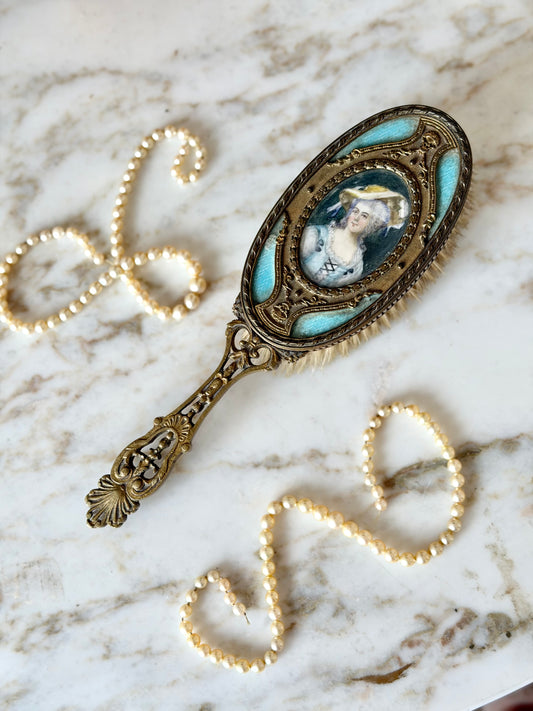 Gilt French guilloché hairbrush with a portrait