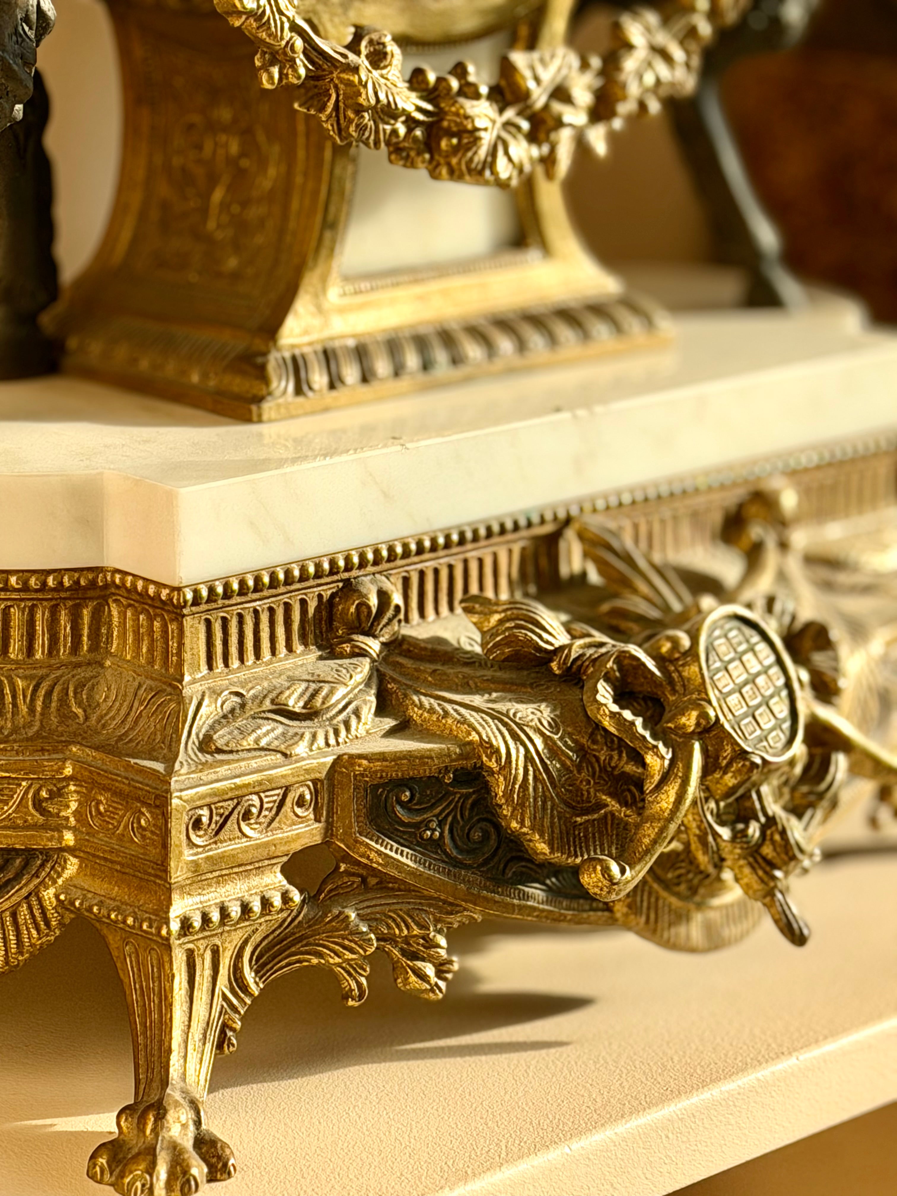 Heavy gilt bronze and marble clock