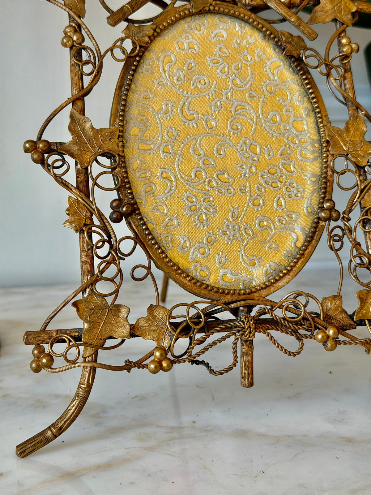 Ornate Gilt Bronze Perched Bird in Vines Frame