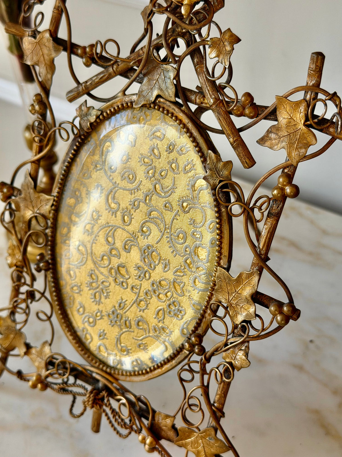 Ornate Gilt Bronze Perched Bird in Vines Frame