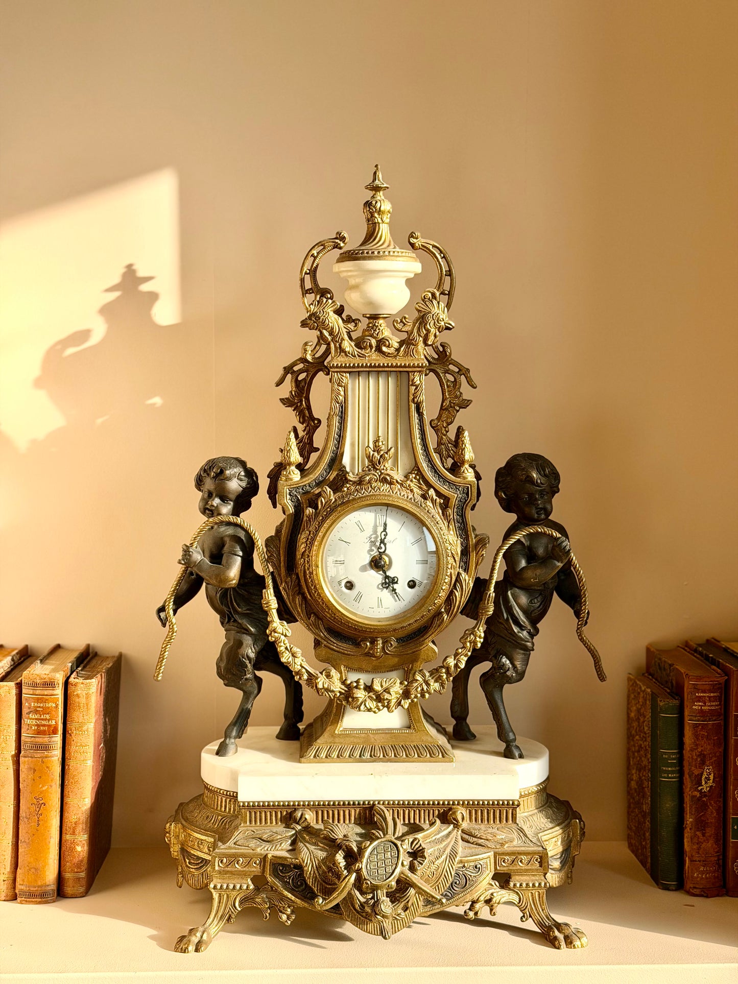 Heavy gilt bronze and marble clock