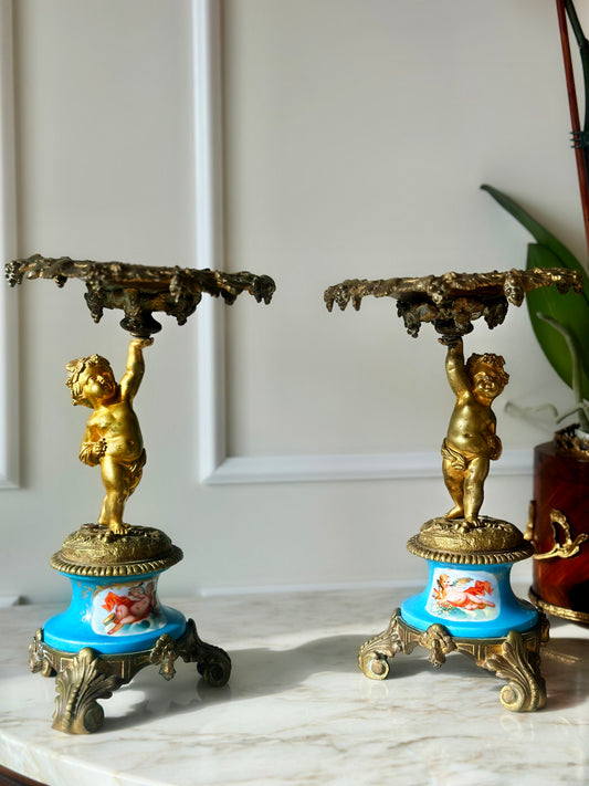 A Pair of Gilt Cherub Tazza Stands