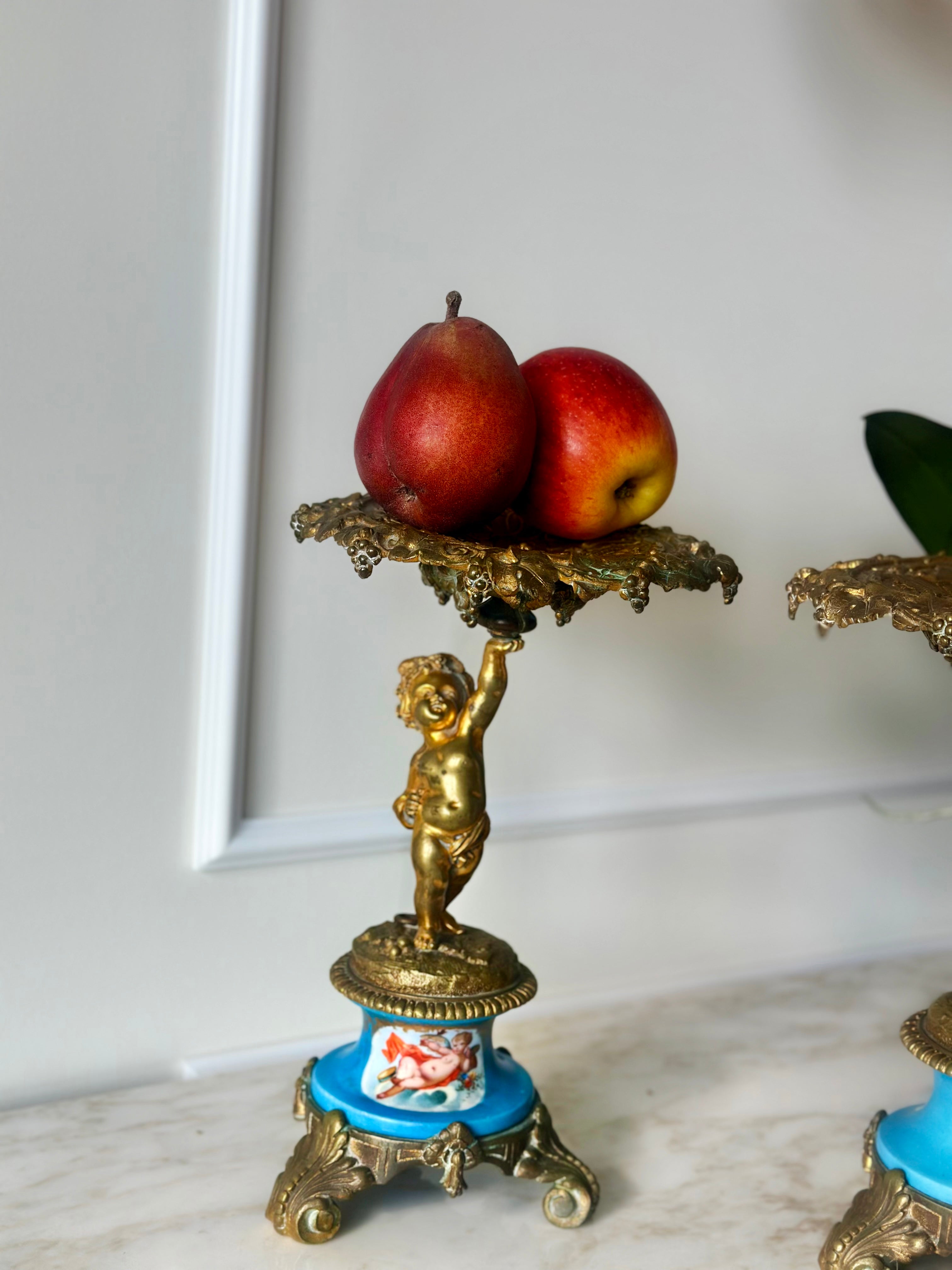 A Pair of Gilt Cherub Tazza Stands